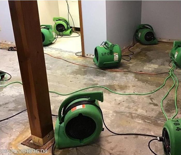 SERVPRO drying equipment being used in water damaged room